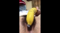 Chinese Slut Puts Banana Up Pussy