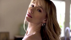 Petite blonde beauty reveals juicy boobs