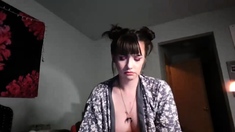 Big boob brunette masturbates on webcam
