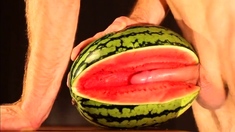 Muscular Stud Fucks and Cums on Watermelon