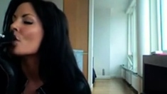 Smoking Hot Brunette Milf in Latex Catsuit and Boots