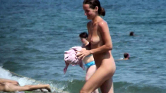 Voyeur girl naked on public beach